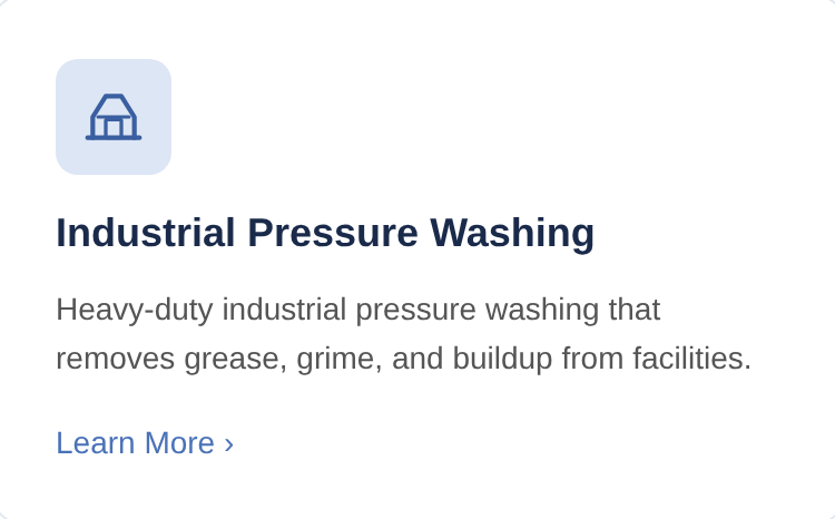Industrial pressure washing at a Mesa Falcon District warehouse loading dock